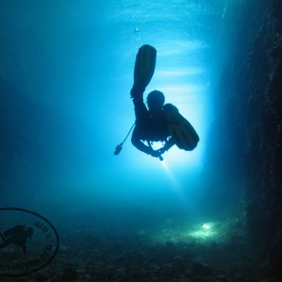 Night diving in Montenegro. Tunnel for submarines